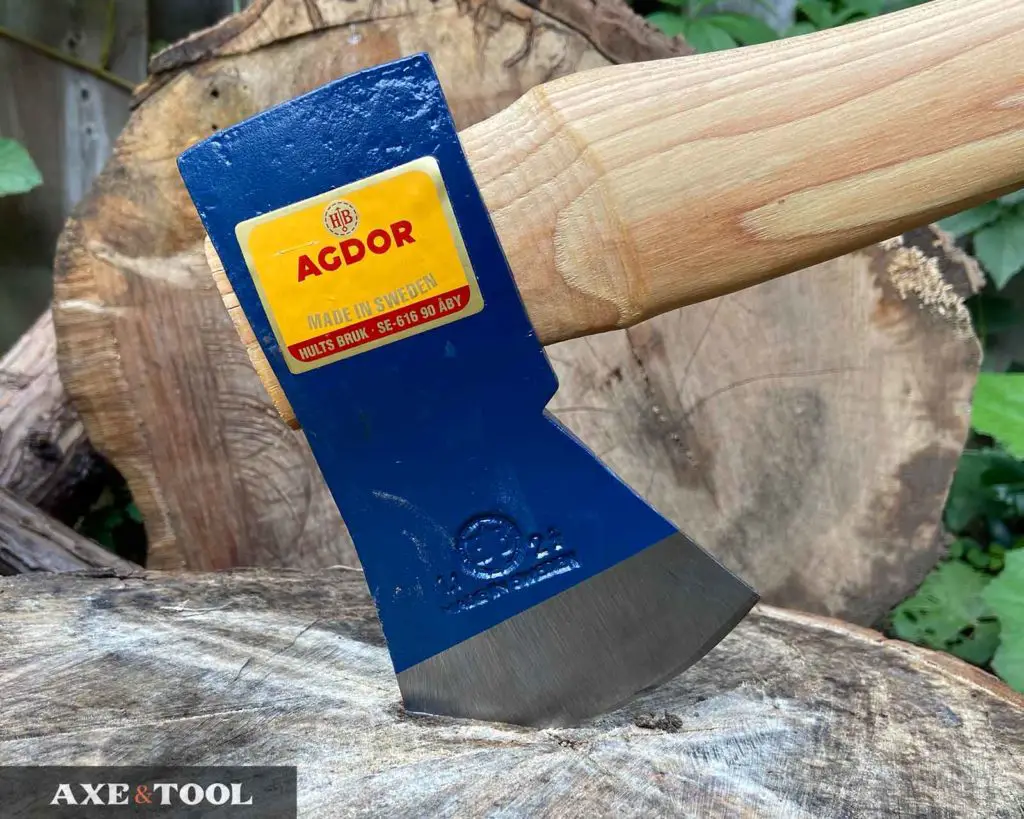 agdor montreal pattern axe head in a log
