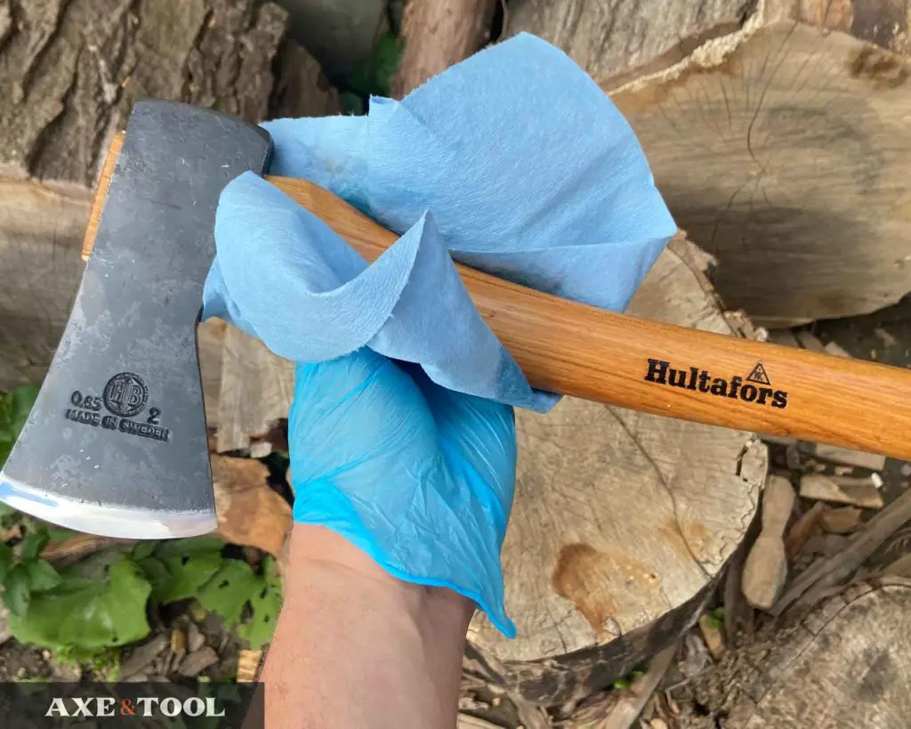 hand oiling a hultafors premium axe