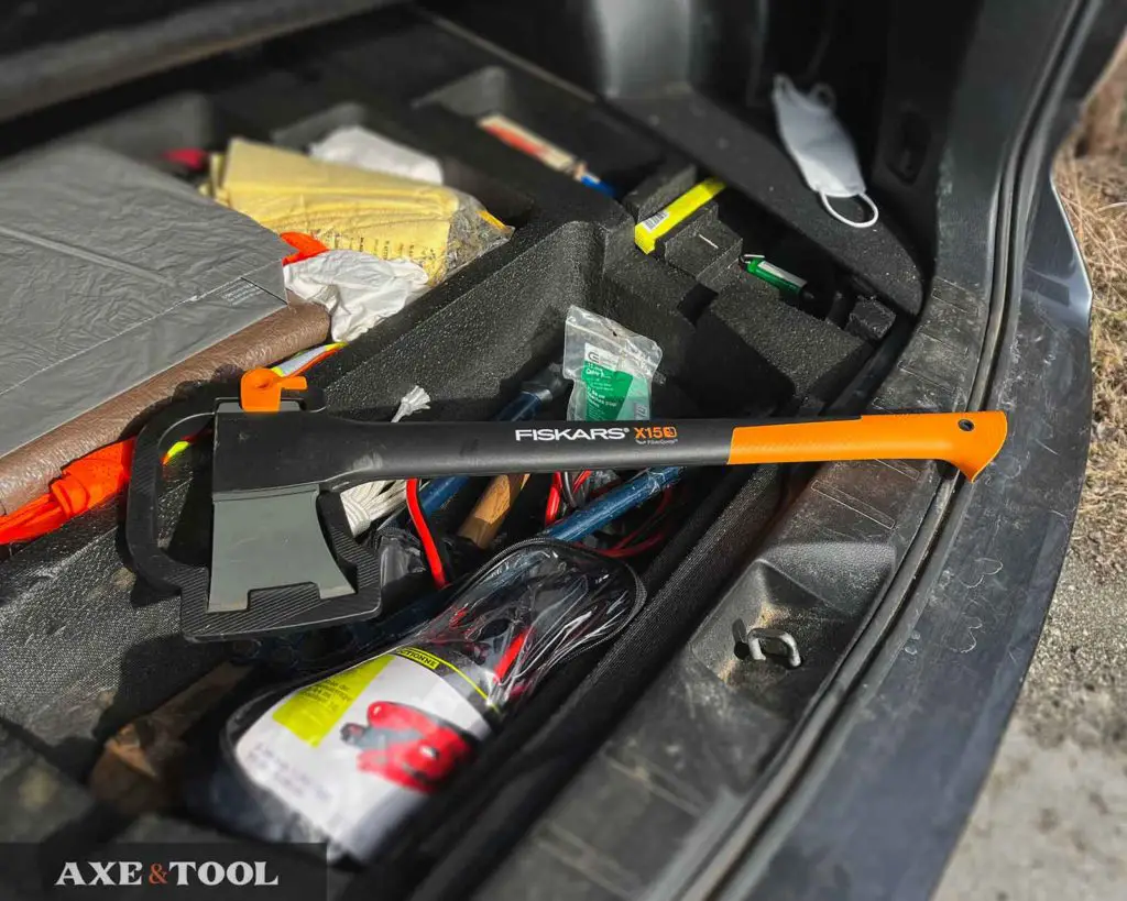 Fiskars X15 axe in the truck of a vehicle