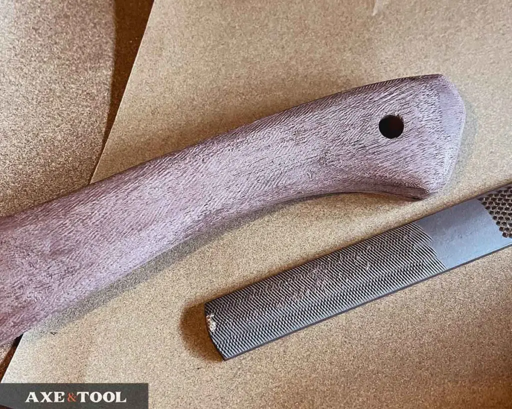 shaped axe handle with rasp and sandpaper