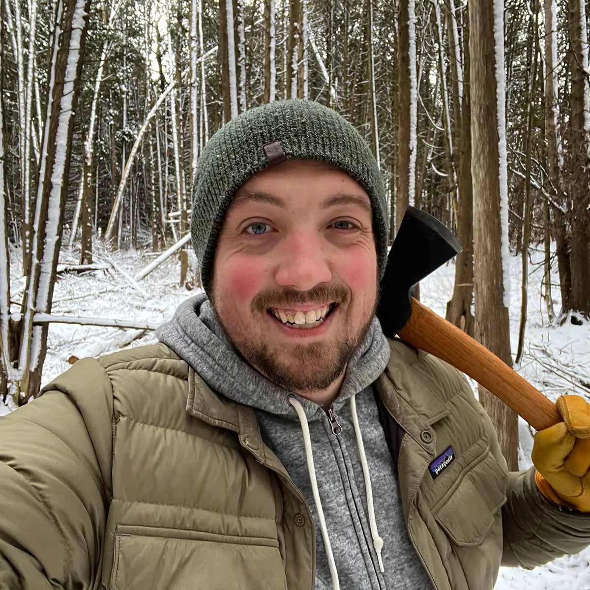 Jim of axeandtool.com in the woods with axe