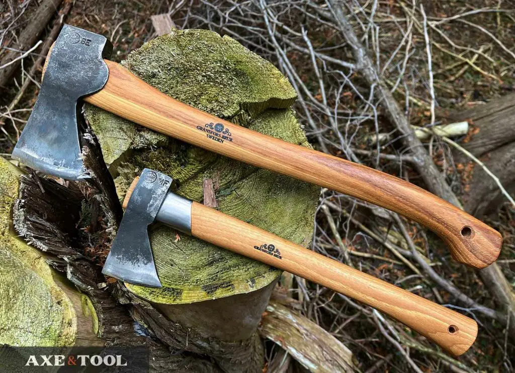Gransfors Bruk Small Forest Axe and Outdoor Axe side-by-side on a stump