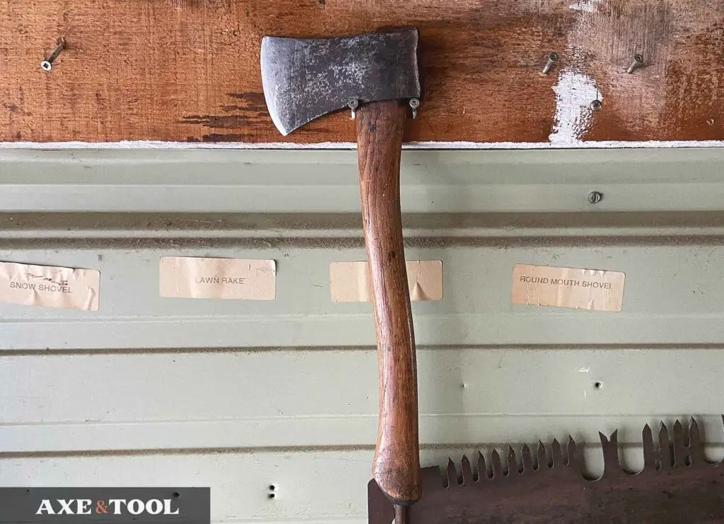 Old hatchet being stored in a garage