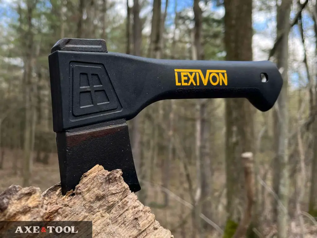 Lexivon V9 hatchet in a log