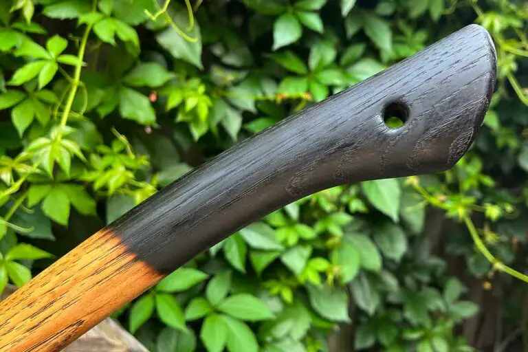A fire blackened axe handle