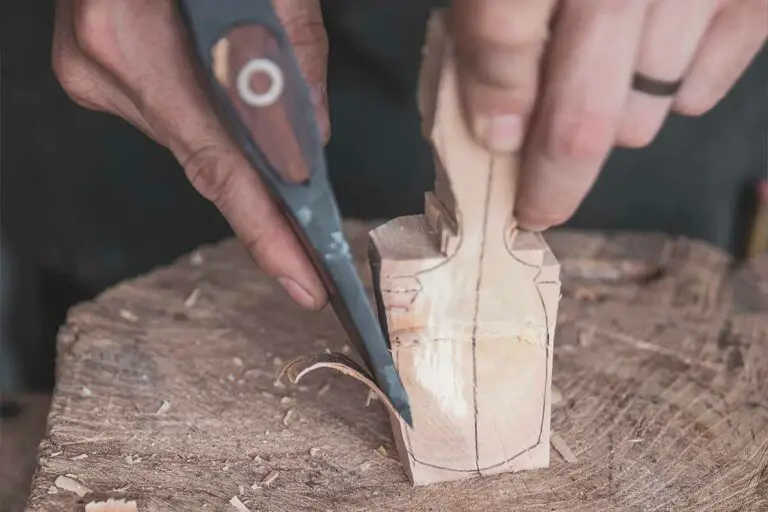 Carving a spoon with an axe
